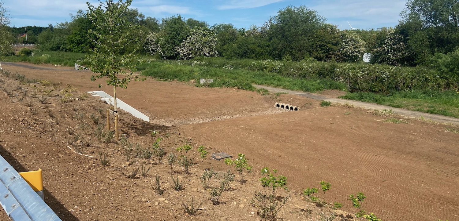 Area
                          of soil with pipes leading into it from both
                          sides