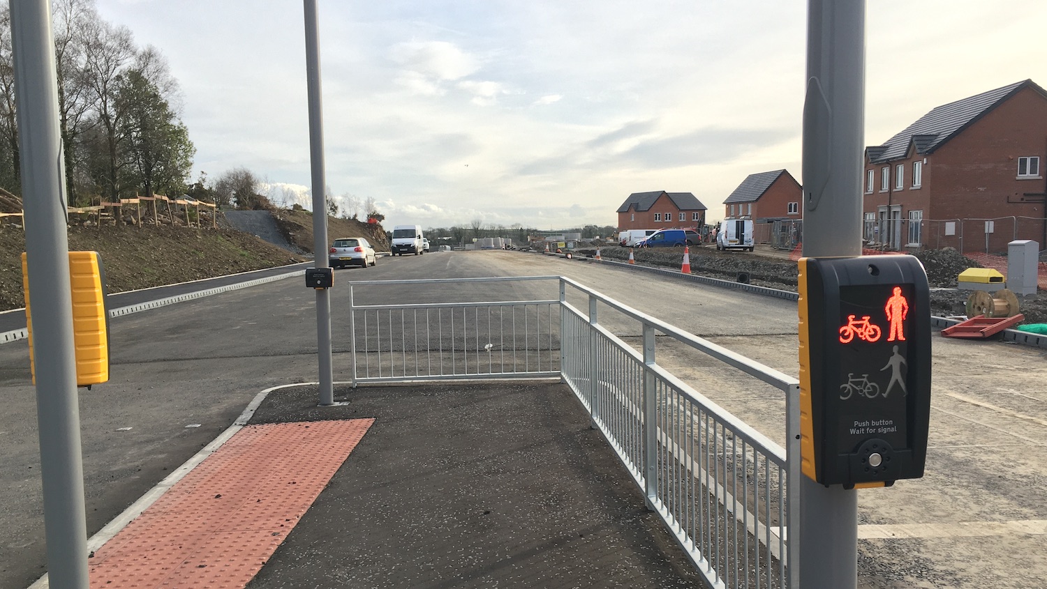 View from a traffic island along a new
road with no lane markings yet painted.
