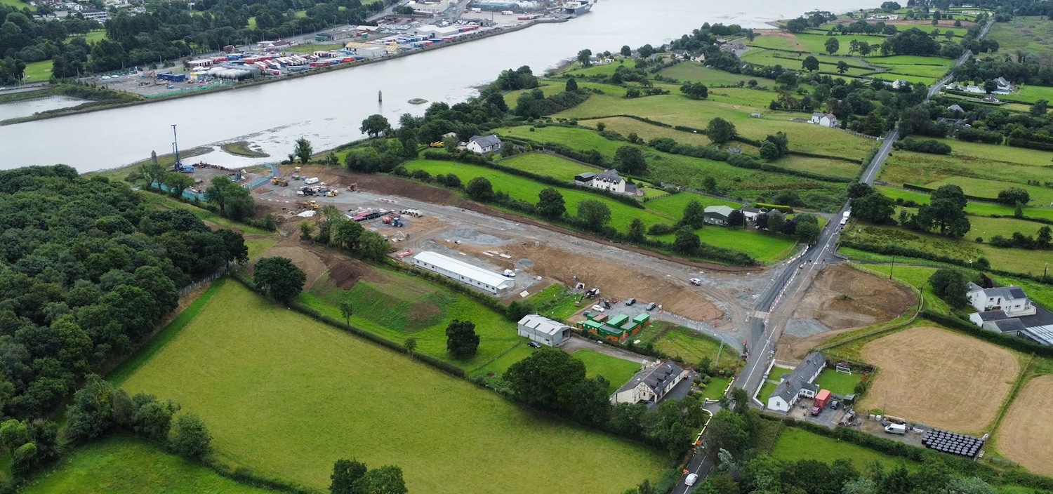 Aerial view with Newry river on left and
R173 on right. Work site extends full length
between them.